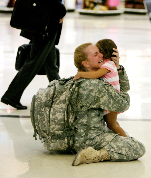 Terri Gurrola is reunited with her daughter after serving in Iraq for 7 months. [2007]